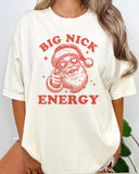 Woman wearing funny Big Nick Energy retro graphic shirt in natural beige color