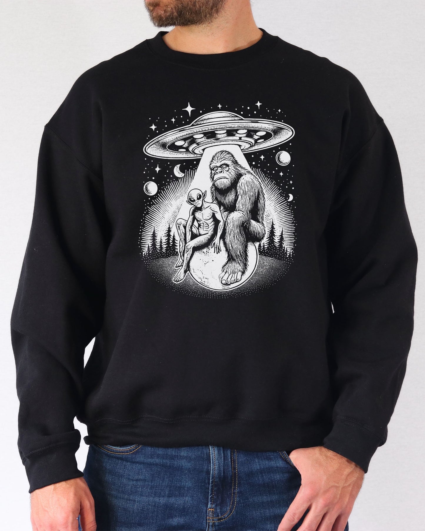 Model wearing black color sweatshirt with 'Bigfoot, Alien And UFO' graphic design