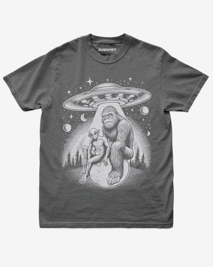 Bigfoot Alien UFO Shirt on pepper tee with retro cosmic forest design