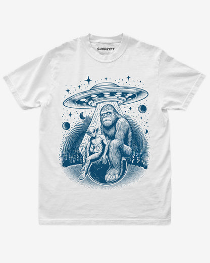 Bigfoot Alien UFO Shirt on white tee with retro cosmic forest design