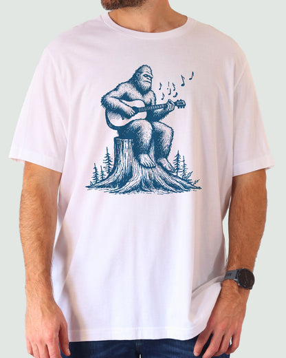 Bigfoot Playing Guitar Shirt white color tee with funny retro graphic of Bigfoot playing guitar