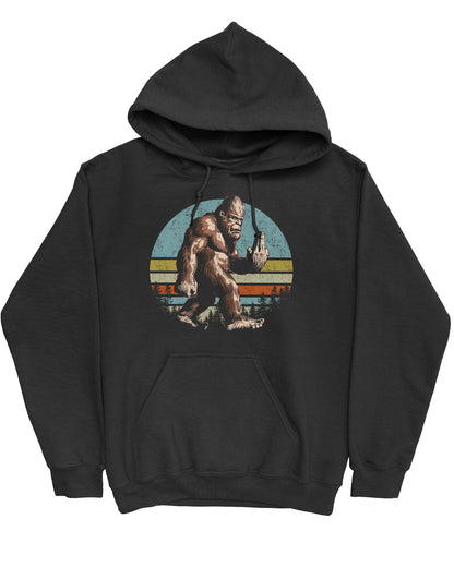 Flat lay of a black hoodie with a funny retro graphic of Bigfoot showing the middle finger.