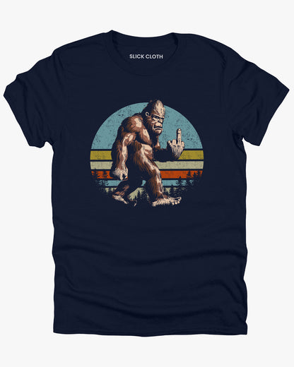 Navy blue color shirt with funny retro Bigfoot showing middle finger graphic. 