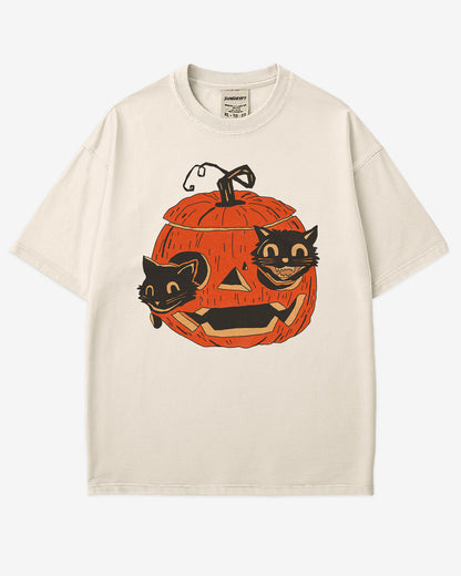 ivory-colored Black Cats in Pumpkin Shirt – retro graphic tee with two black cats inside a carved Halloween pumpkin