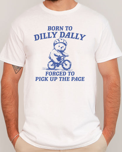 Man wearing Born To Dilly Dally Shirt in white color showing a retro bear graphic and the quote "Born To Dilly Dally, Forced To Pick Up The Pace"