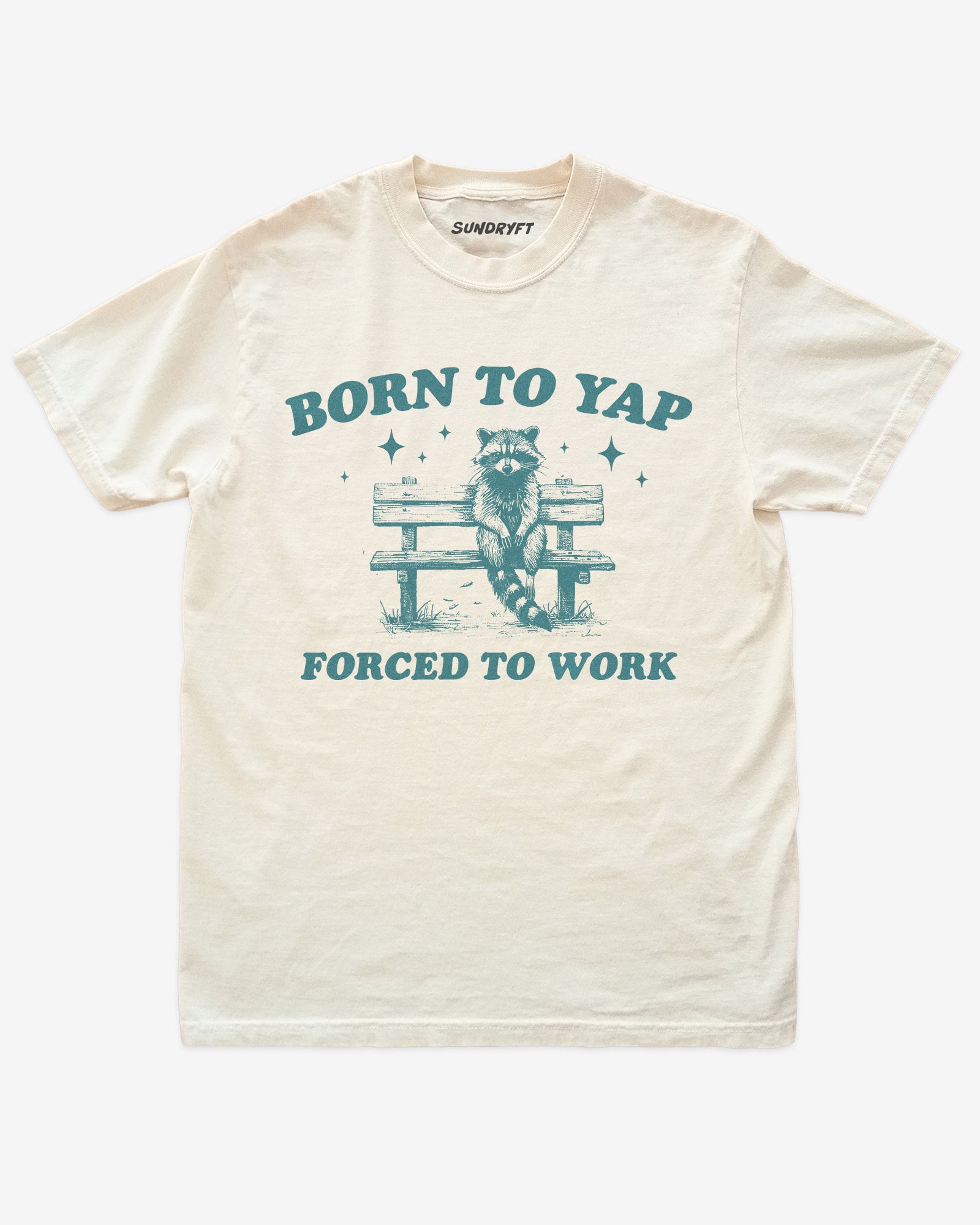 Born To Yap Forced To Work shirt in ivory with funny retro graphic of raccoon sitting on bench