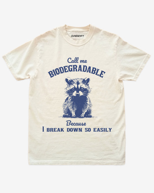 Call Me Biodegradable Because I Break Down So Easily Shirt in ivory with retro raccoon graphic