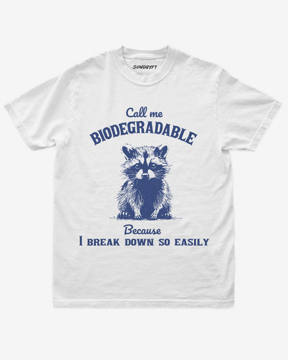 Call Me Biodegradable Because I Break Down So Easily Shirt in white with retro raccoon graphic