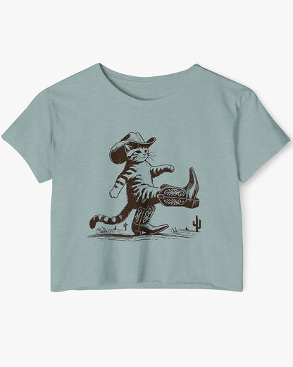 Flat lay stonewash green crop top featuring a funny retro cowboy cat graphic.