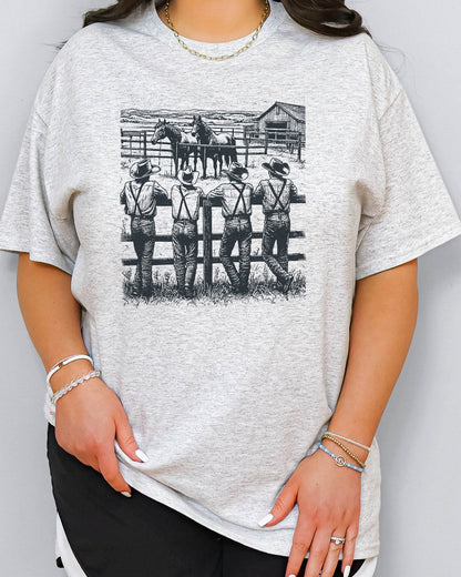 Woman wearing retro graphic cowboy gang shirt in ash grey color