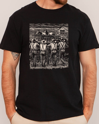 Man wearing retro graphic cowboy gang shirt in black color