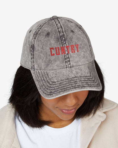 Woman wearing Cuntry embroidered vintage cap in charcoal gray