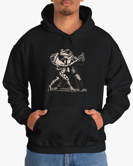 Man wearing black hoodie with retro funny dancing frogs graphic