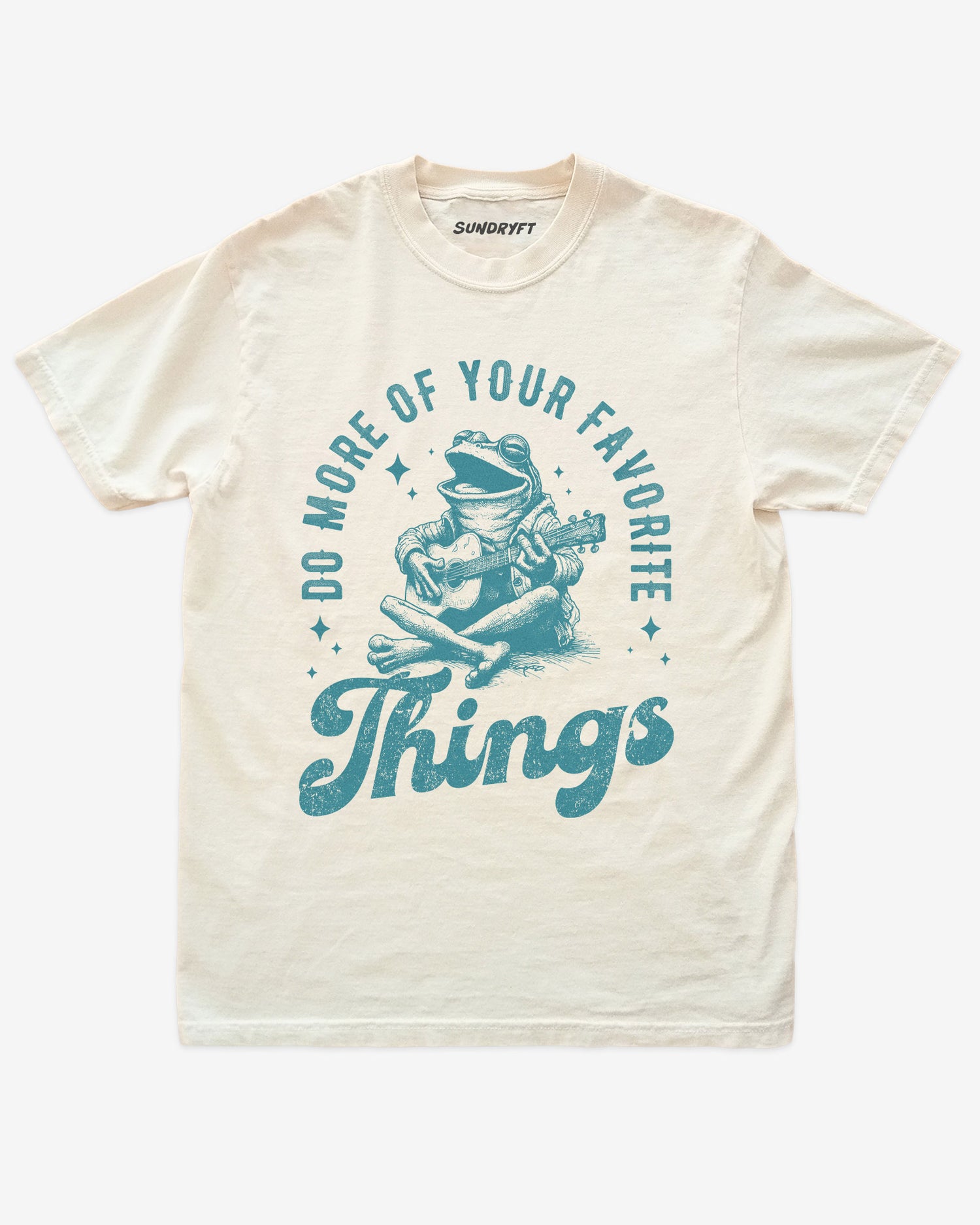 Do More Of Your Favorite Things shirt in ivory with frog playing guitar graphic