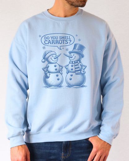 Model wearing light blue color sweatshirt with 'Do You Smell carrots?' snowmen conversation graphic design