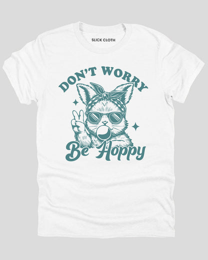 Flat lay white-colored 'Don't Worry, Be Hoppy' shirt featuring a funny retro easter bunny graphic.