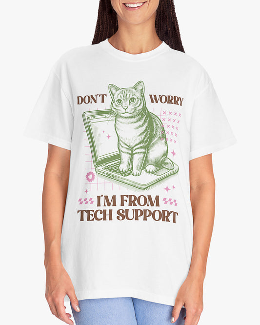 Woman wearing white 'Don't Worry I'm From Tech Support' shirt with funny retro cat sitting on computer graphic