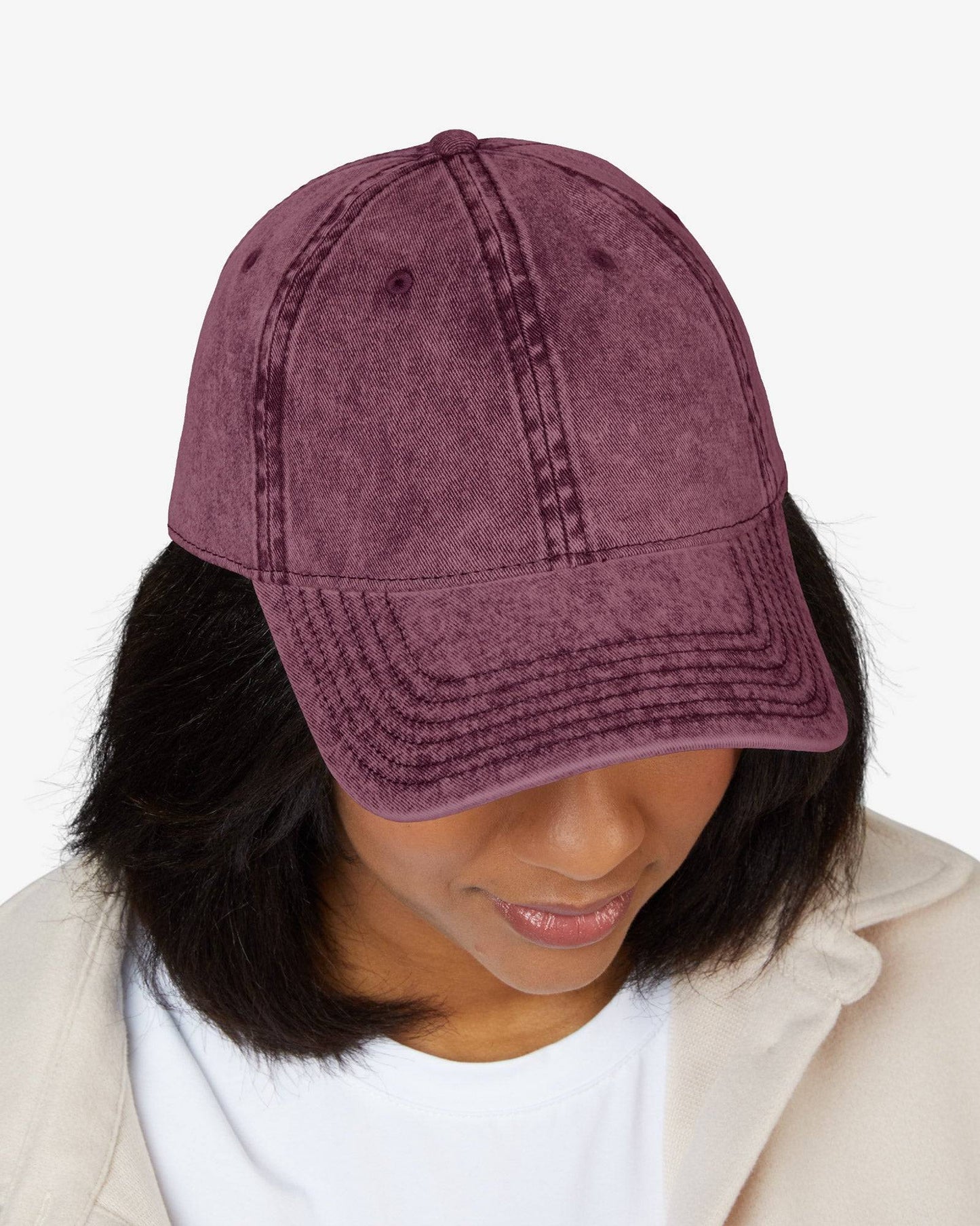 Woman wearing vintage cap in maroon color