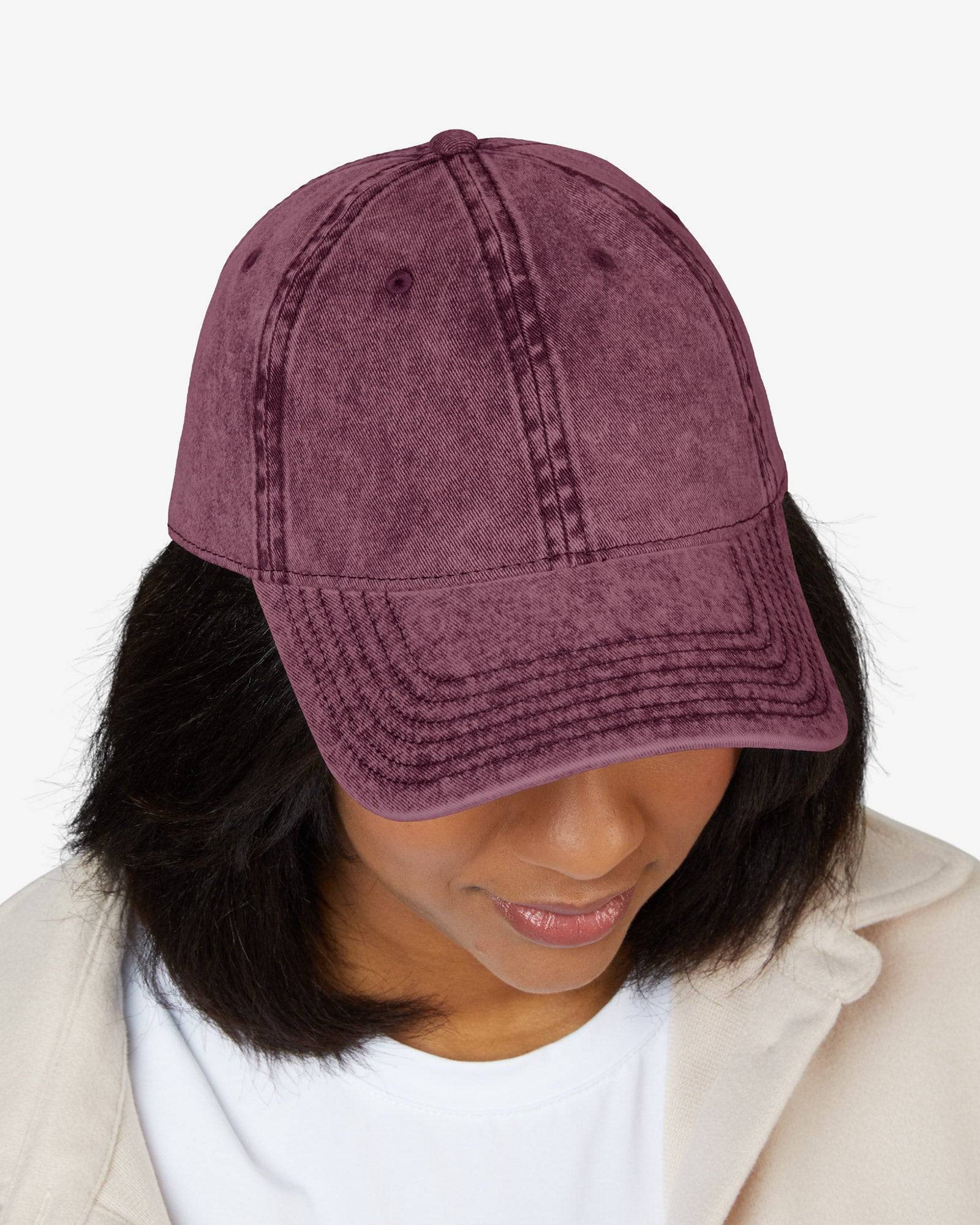 Woman wearing vintage cap in maroon color