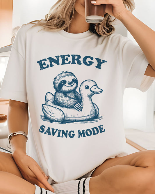 Close-up of woman wearing white color shirt with 'Energy Saving Mode' funny sloth graphic design