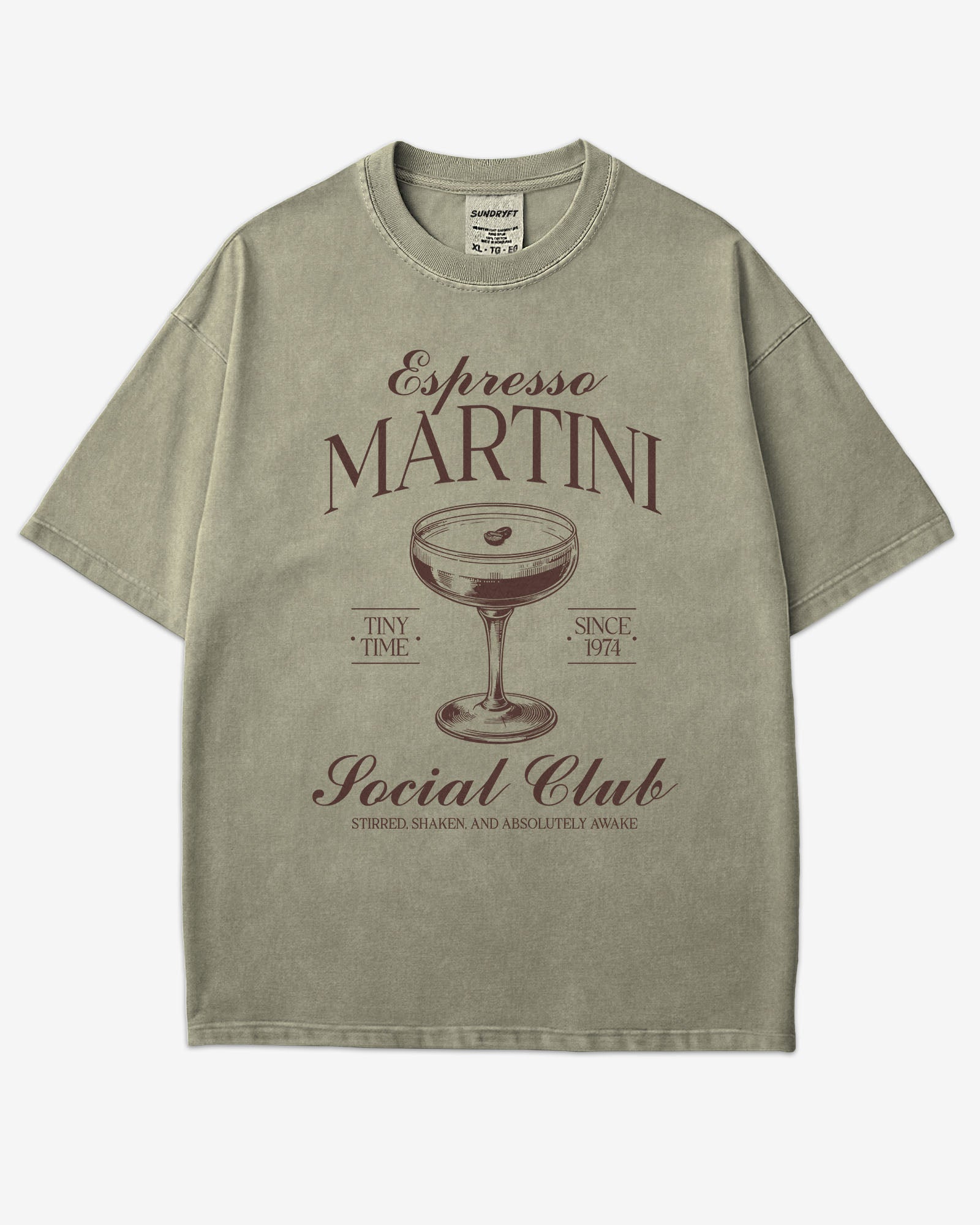 Flat lay khaki 'Espresso Martini Social Club – Stirred, Shaken, and Awake' shirt with a retro graphic of an espresso martini glass.