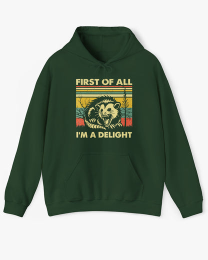 'First of All I'm A Delight' hoodie in forest green, featuring a retro western graphic design and unisex fit.
