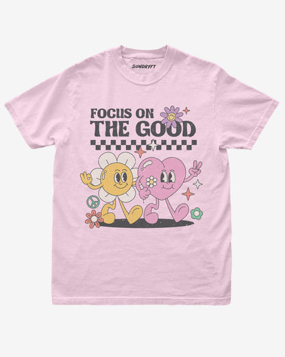 Focus On The Good shirt in blossom with retro walking flower and heart graphic