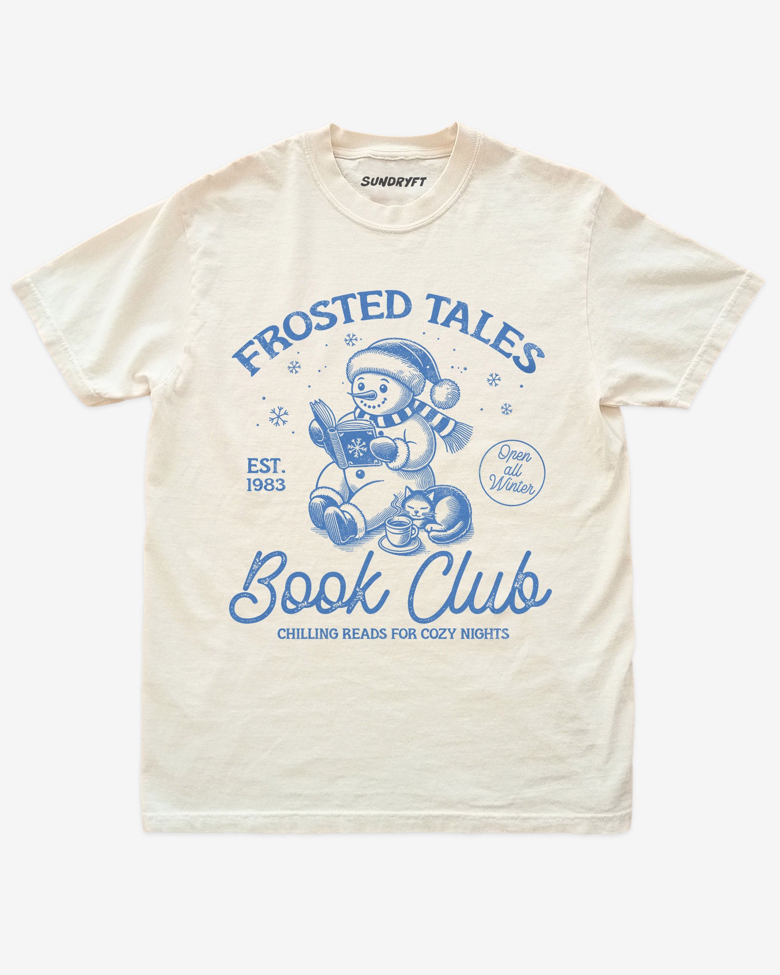 Ivory shirt with cute snowman reading book design and “Frosted Tales Book Club” text