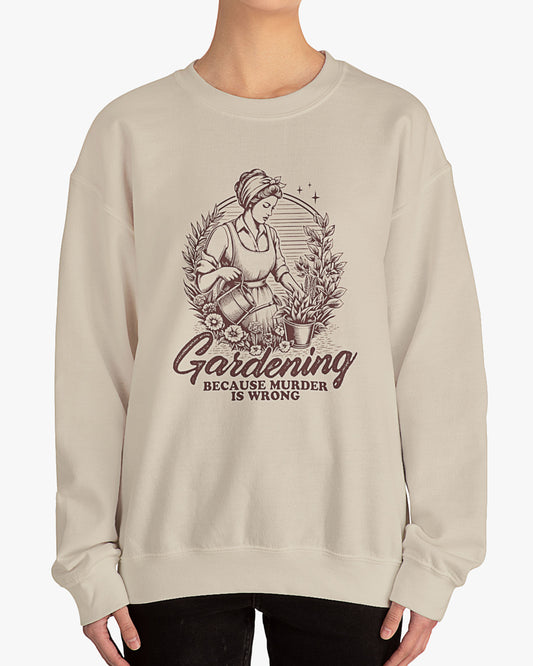 Woman wearing sand beige 'Gardening Because Murder Is Wrong' Graphic Sweater