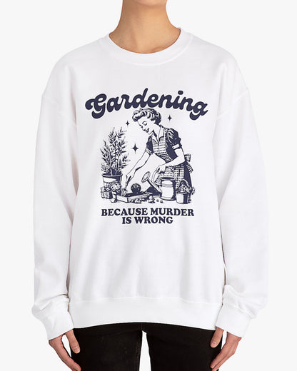 Woman wearing white 'Gardening Because Murder Is Wrong' Sweatshirt