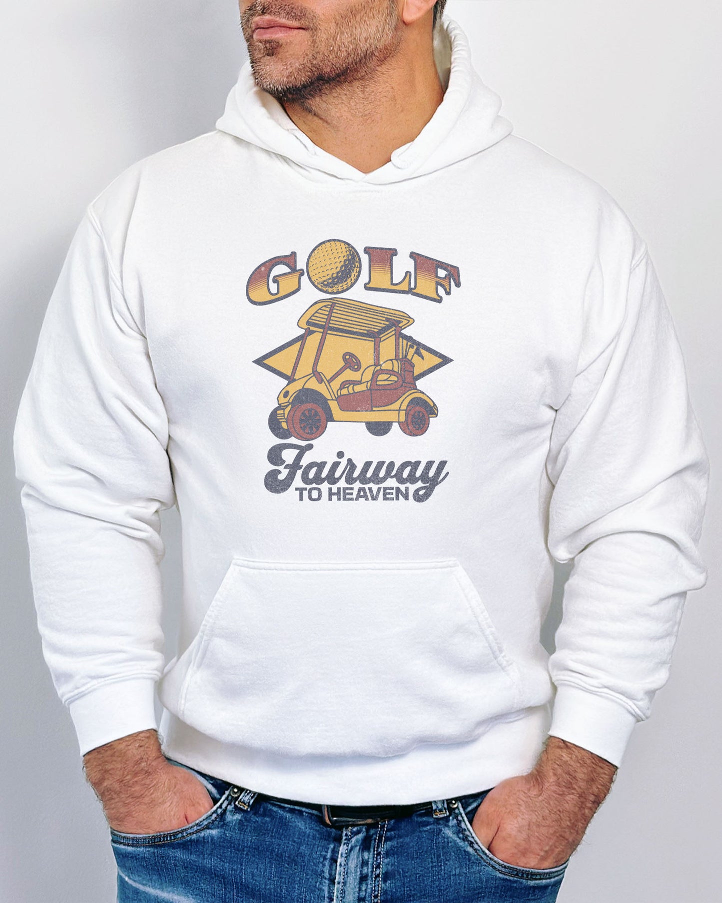 Man wearing a white hoodie with a retro graphic of a golf cart and the quote 'Golf, Fairway To Heaven'.