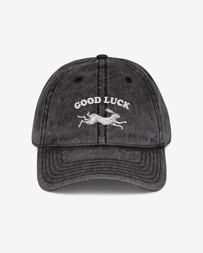 Good Luck embroidered vintage cap in black with retro graphic of running rabbit