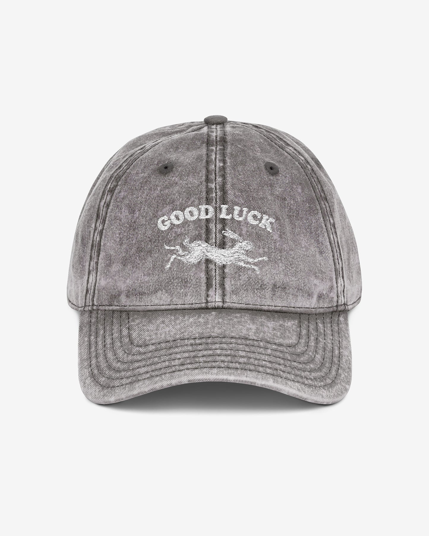 Good Luck embroidered vintage cap in charcoal gray with retro graphic of running rabbit