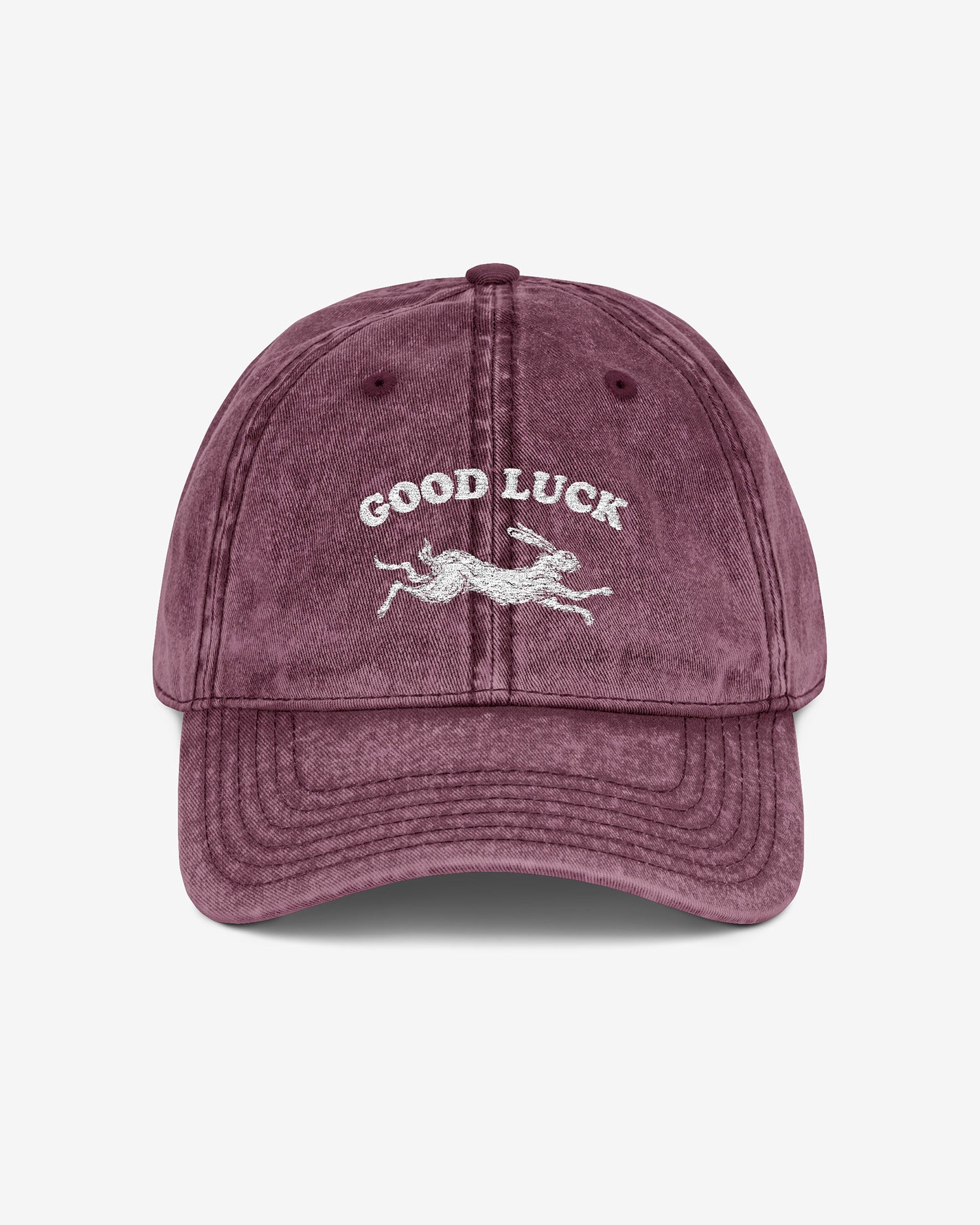 Good Luck embroidered vintage cap in maroon with retro graphic of running rabbit