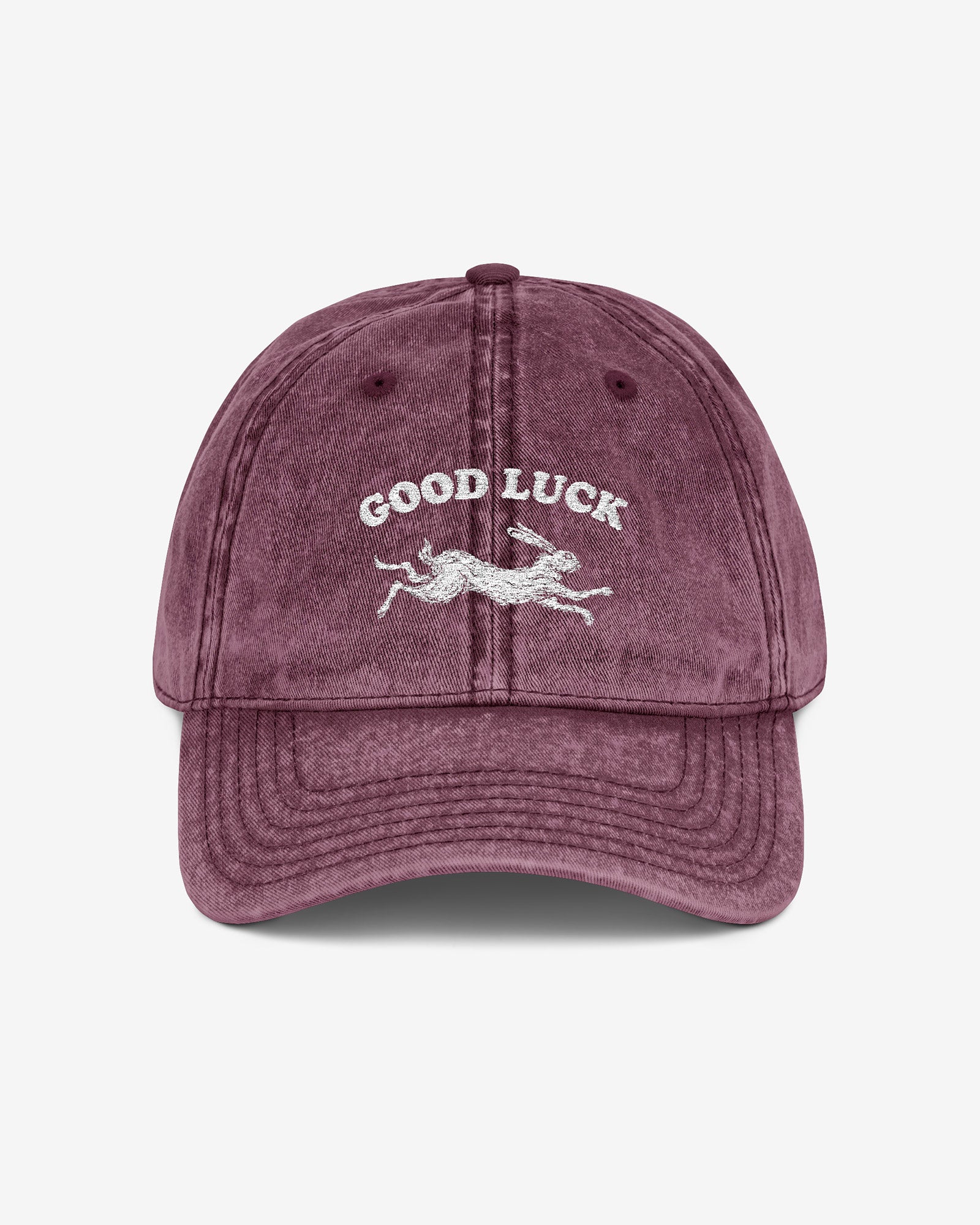 Good Luck embroidered vintage cap in maroon with retro graphic of running rabbit