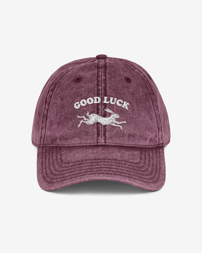 Good Luck embroidered vintage cap in maroon with retro graphic of running rabbit