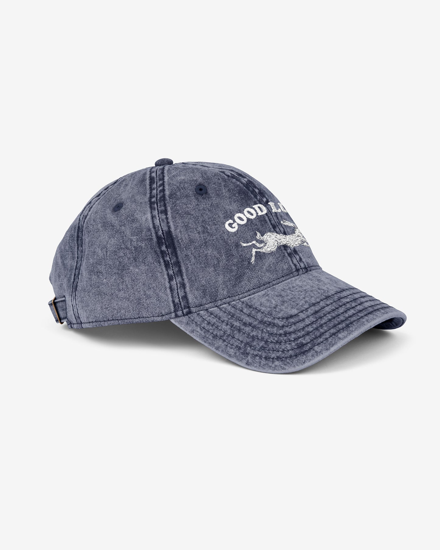 Good Luck embroidered vintage cap in navy with retro graphic of running rabbit