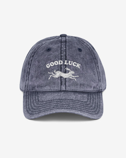 Good Luck embroidered vintage cap in navy with retro graphic of running rabbit