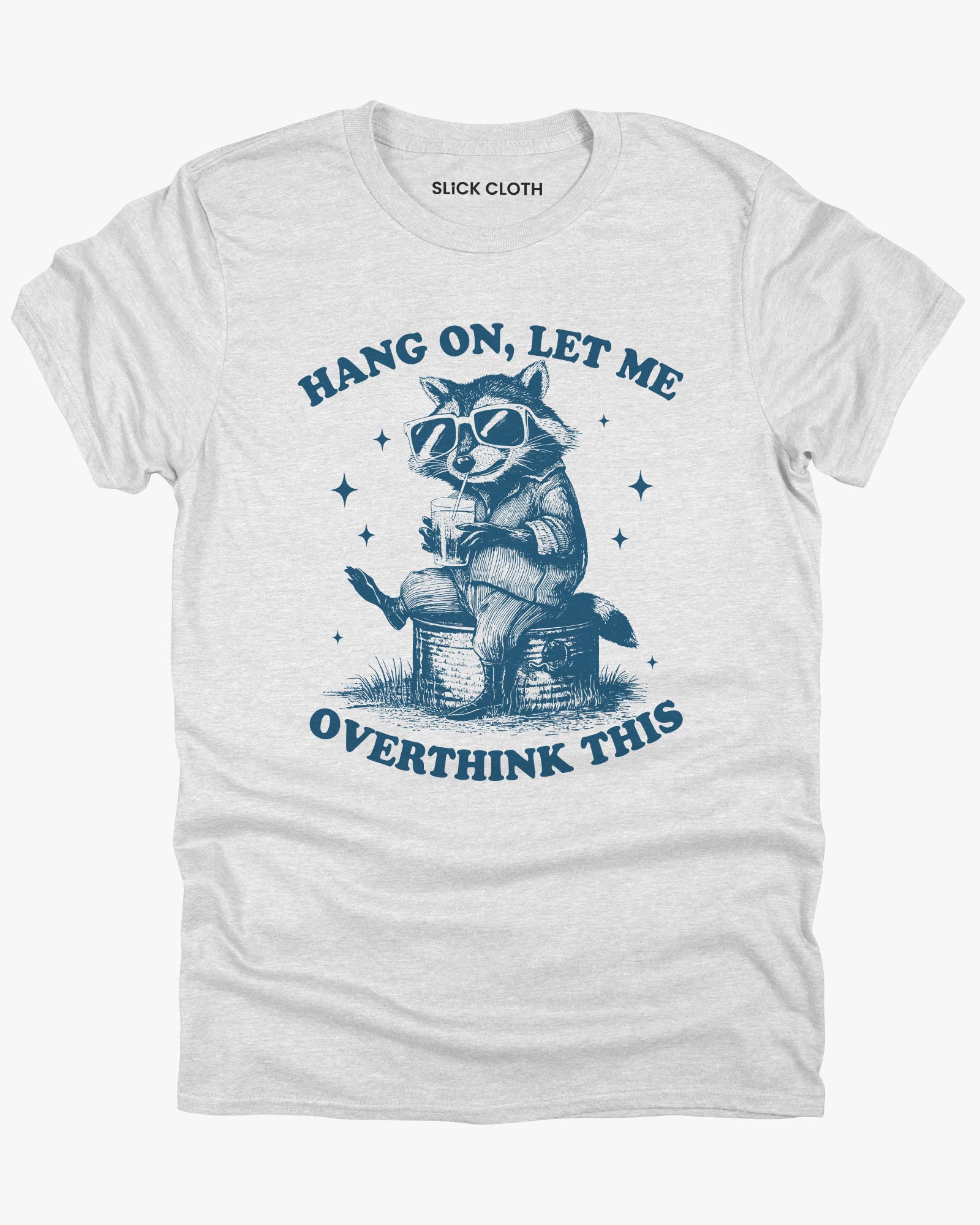 Flat laying ash gray color 'Hang On, Let Me Overthink This' shirt with funny raccoon wearing sunglasses graphic.