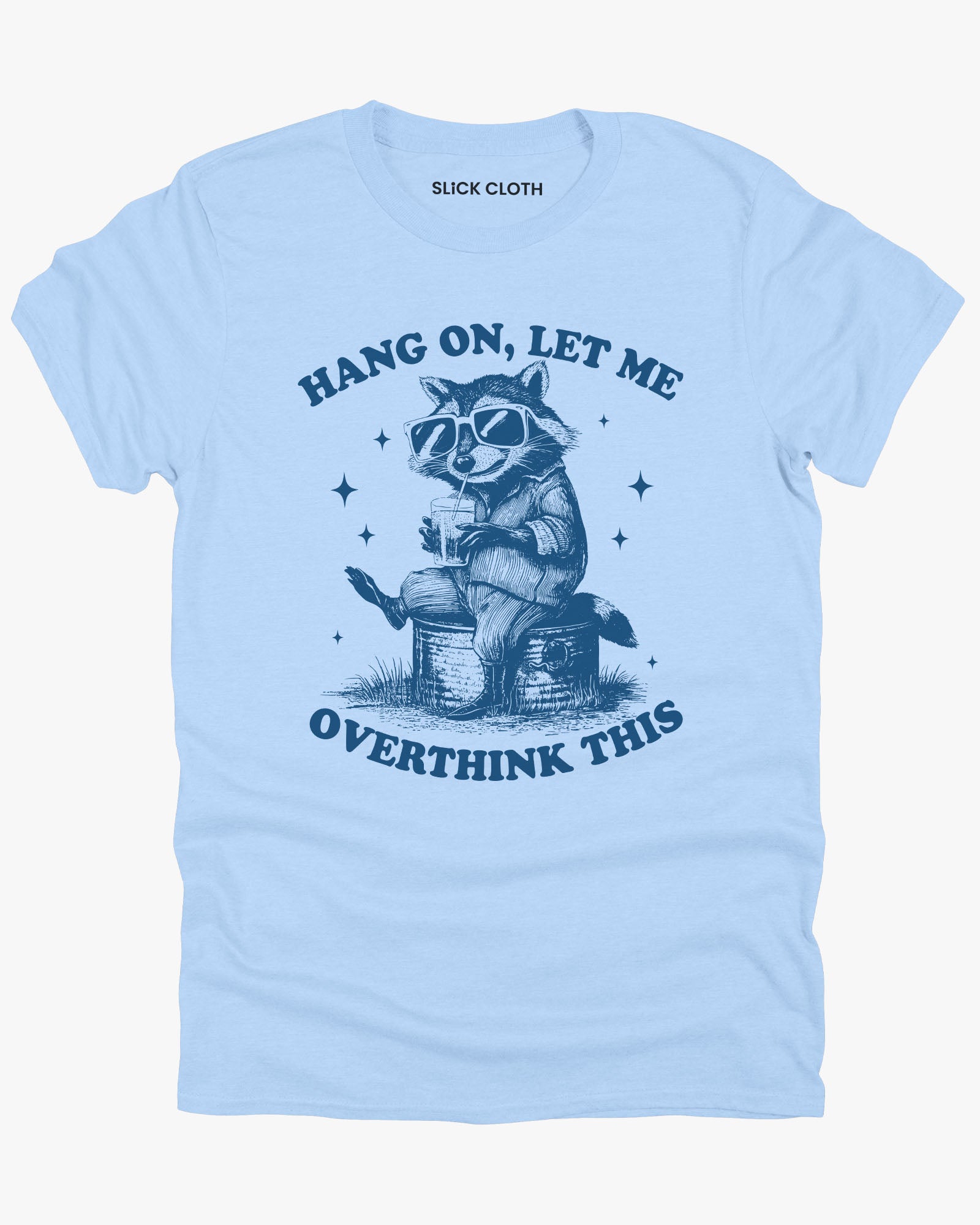 Flat lay light blue color 'Hang On Let Me Overthink This' shirt with funny retro raccoon wearing sunglasses graphic.