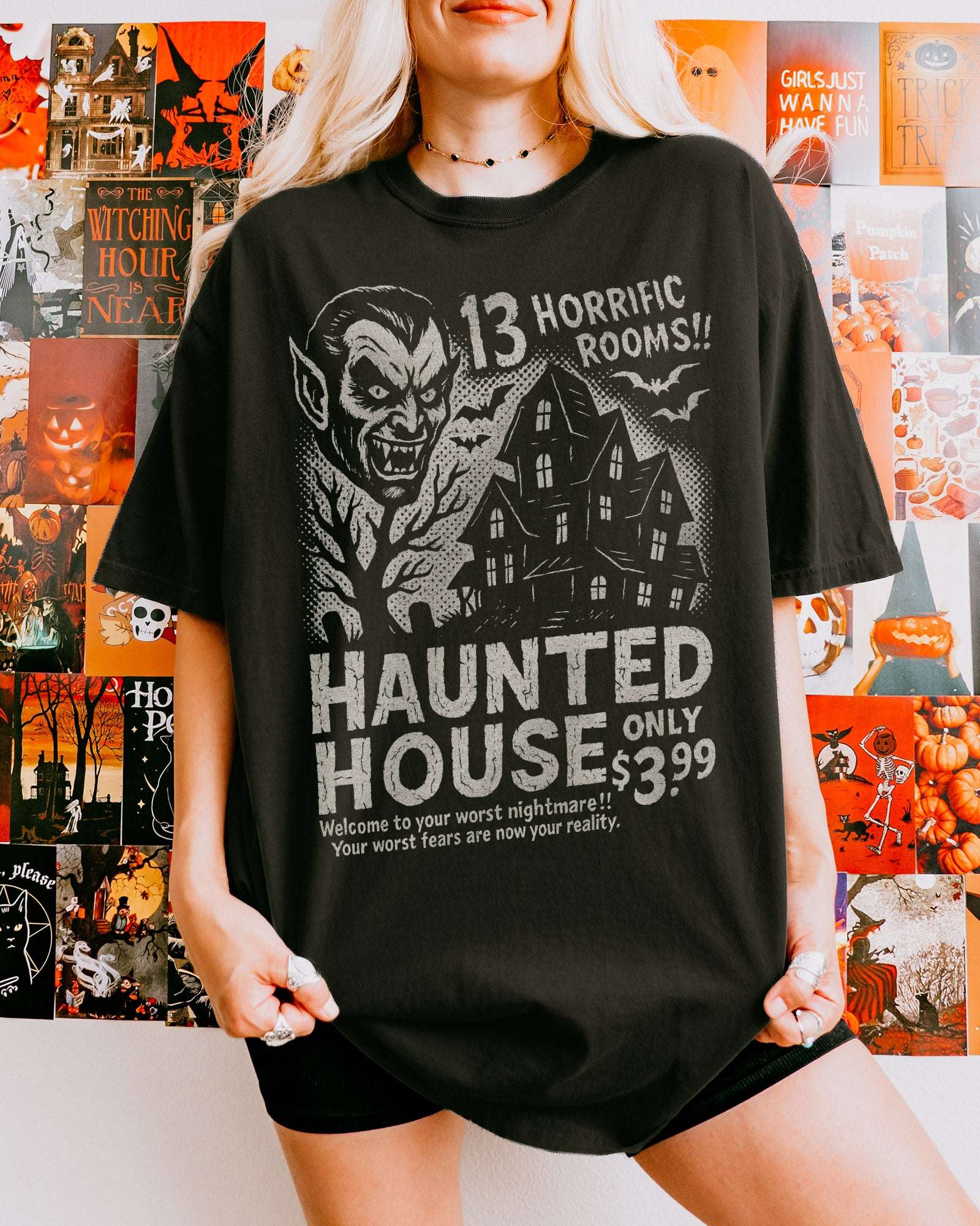 Woman wearing black retro Haunted House Room Renting Shirtwith vintage Halloween graphic