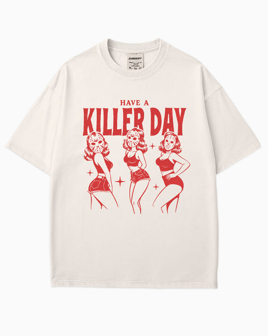 Flat lay ivory “Have A Killer Day” shirt with a funny Halloween graphic of bikini girls in hockey masks.