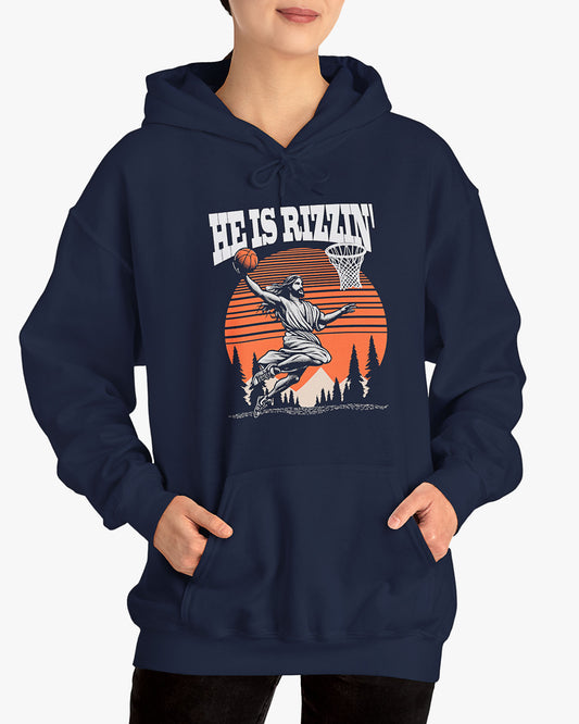 Woman wearing navy blue 'He Is Rizzin' hoodie featuring retro Jesus dunking basketball graphic, ideal for Easter.