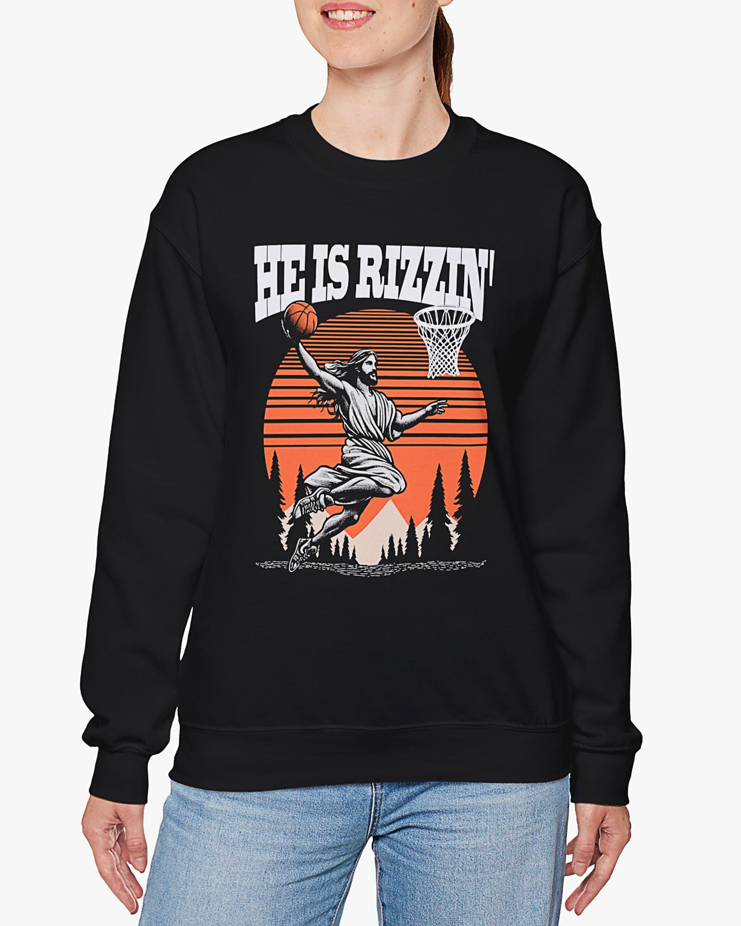 Woman wearing black 'He Is Rizzin' sweatshirt with retro Jesus dunking basketball graphic, perfect for Easter and funny Y2K style.
