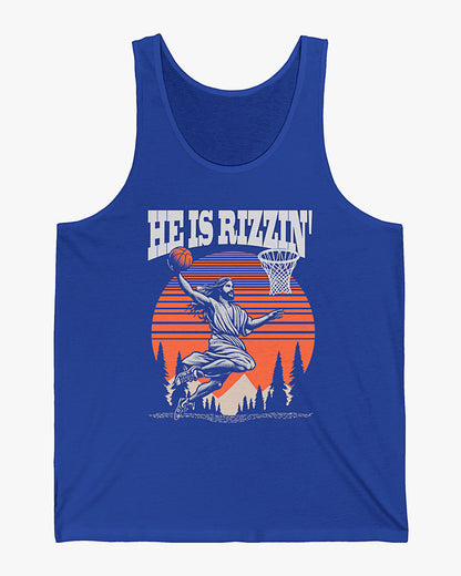'He Is Rizzin' tank top in true royal blue featuring a funny retro graphic of Jesus dunking a basketball, perfect for summer style and humor.