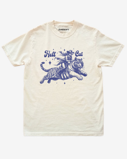 "Hell Cat" shirt in ivory with a retro graphic of a cowgirl riding a tiger.