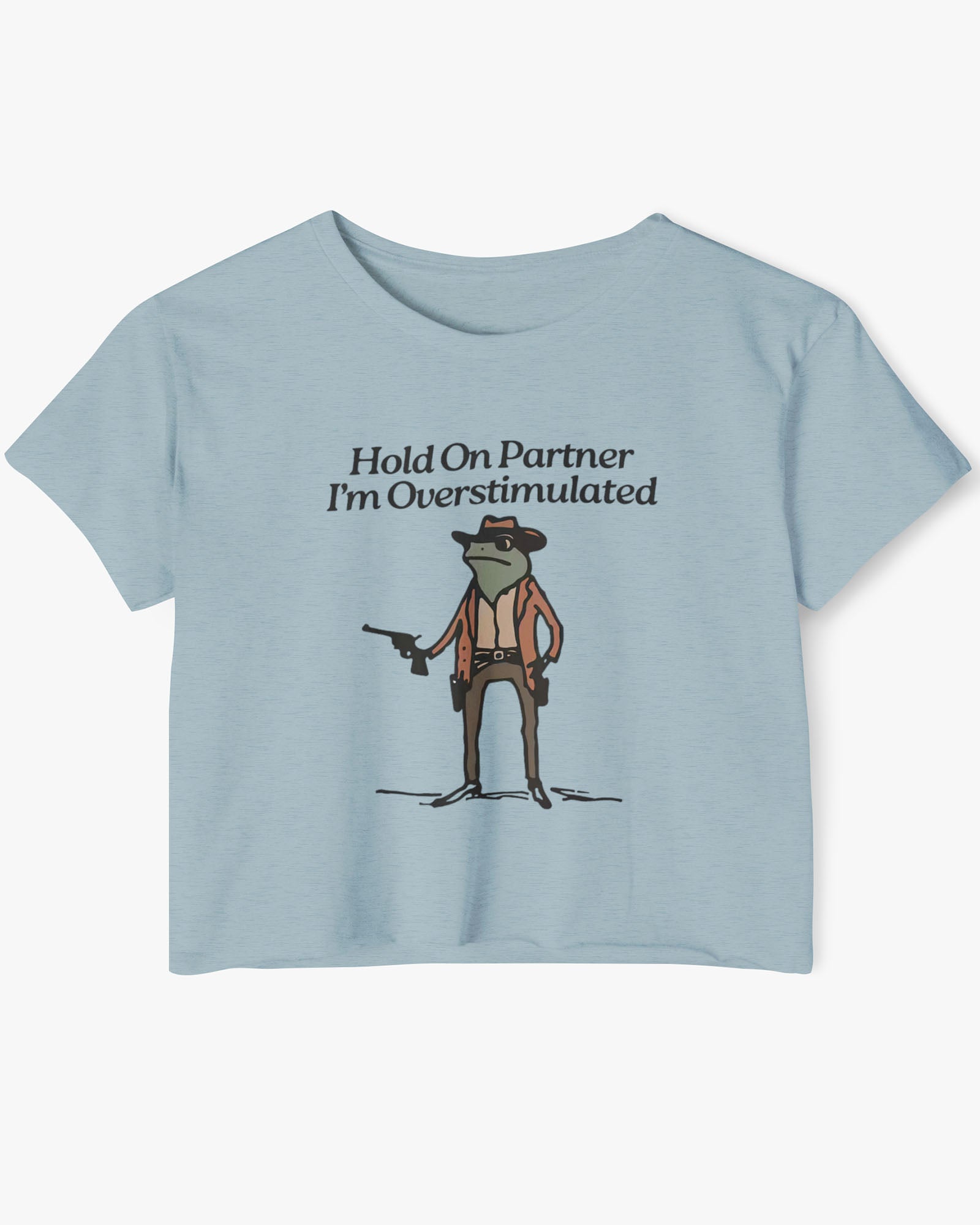 Flat lay stonewash denim 'Hold On Partner, I'm Overstimulated' crop top featuring a funny retro cowboy frog graphic.