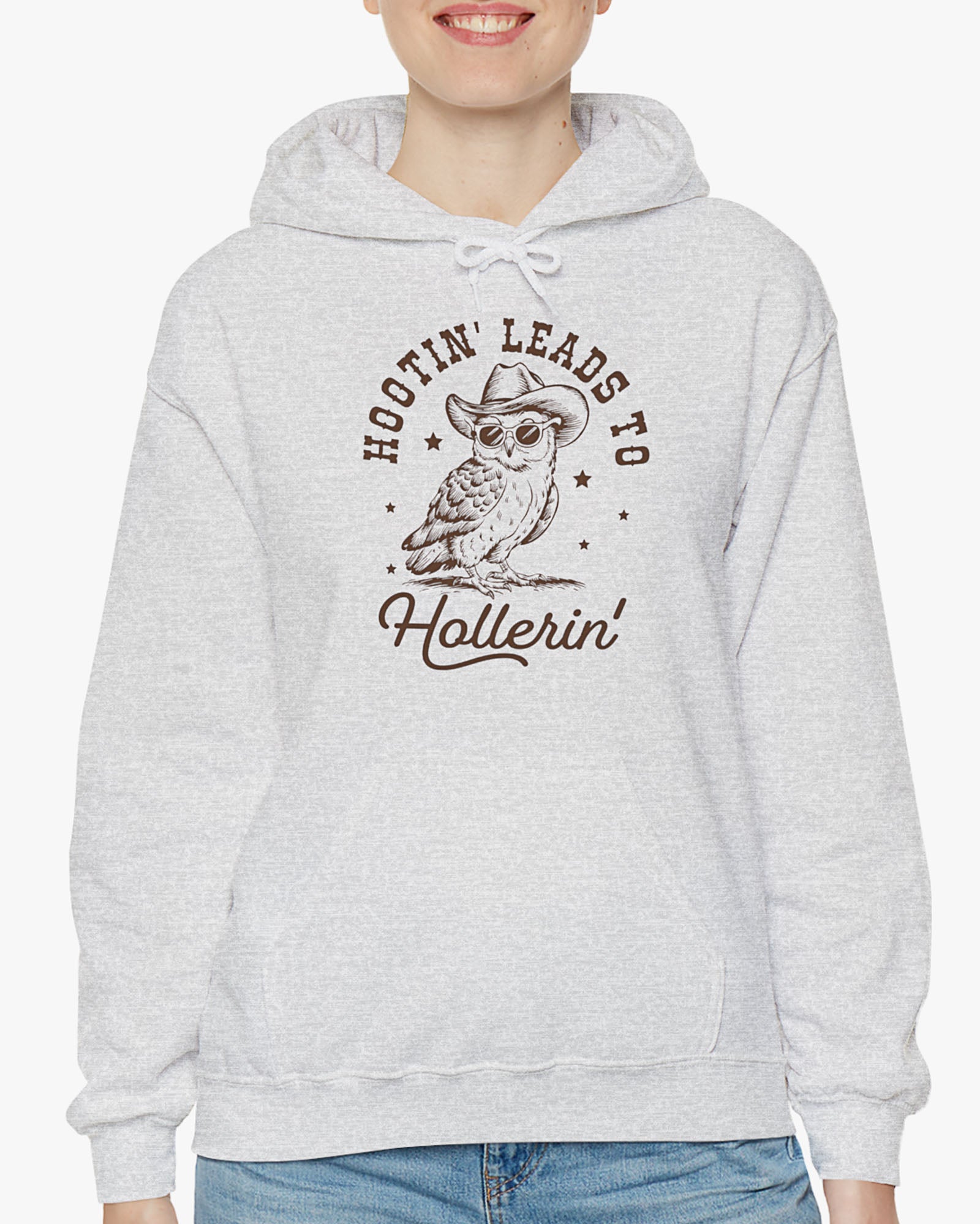 Woman wearing ash gray Hootin' Leads To Hollerin' hoodie with funny retro cowboy owl graphic