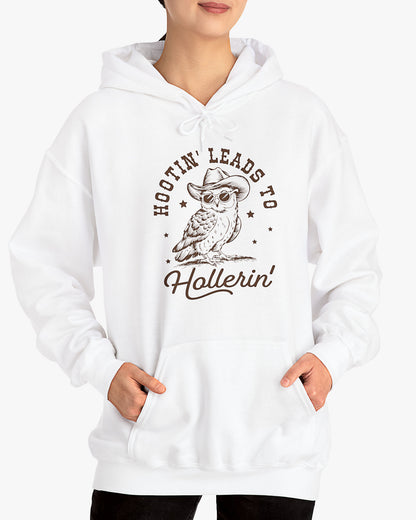 Woman wearing white Hootin' Leads To Hollerin' hoodie with funny retro cowboy owl graphic