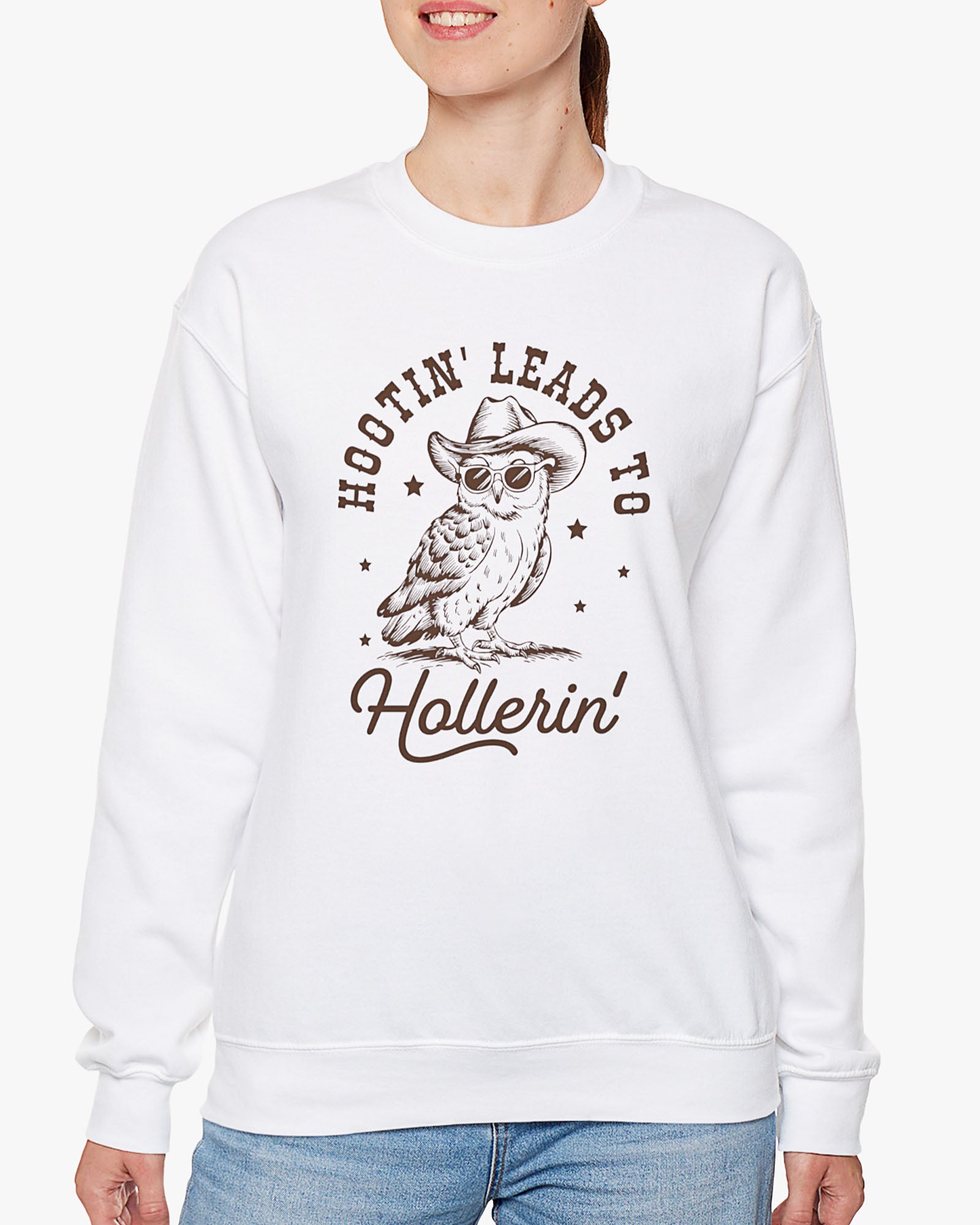 Woman wearing white 'Hootin Leads To Hollerin' sweatshirt with funny retro owl graphic